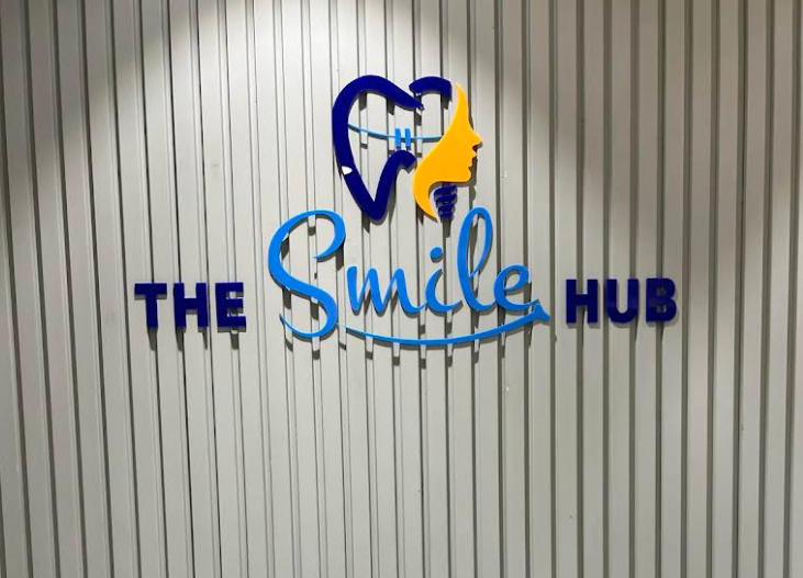 The Smile Hub branded logo wall